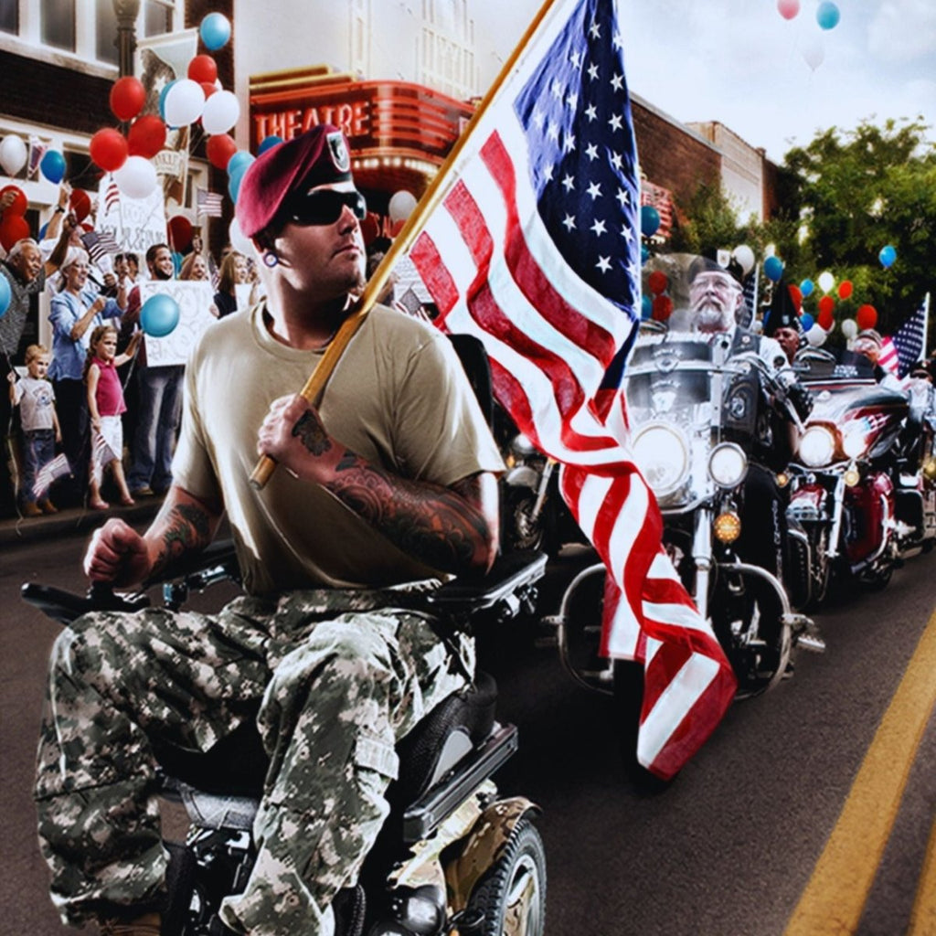 Soldier holding American flag in a wheelchair in a parade with people along the street cheering.