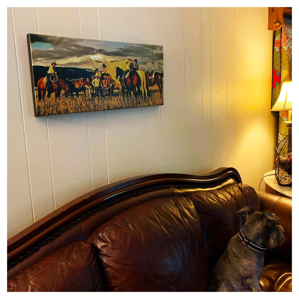 Cowboy Gathering canvas print on wall about sofa in customer testimonial for Michael W. Rutherford Photo Artistry.