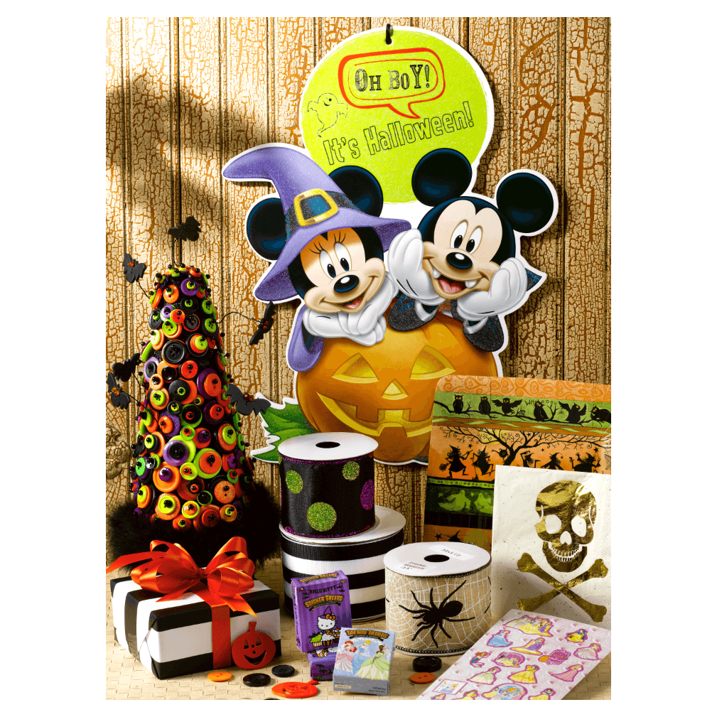 Halloween & Holiday Season: Minnie and Mickey Mouse poster above pumpkins with halloween decorations.