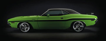 1970 Dodge Challenger RT in vibrant green with chrome details on a black background.