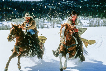 "Snowbound Sprint" - two cowboys racing horses through snow, vintage effect, limited edition photograph by Michael W. Rutherford.